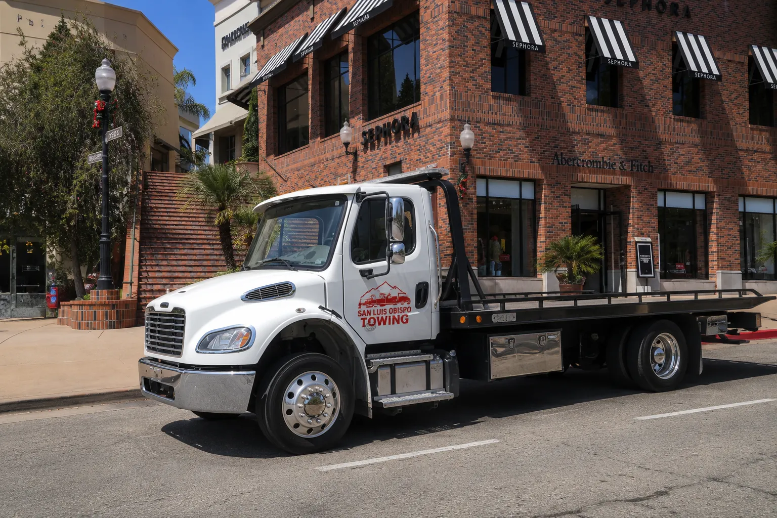 San Luis Obispo Towing flatbed truck in downtown San Luis Obispo